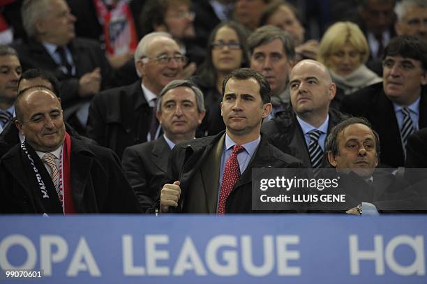 Spanish crown Prince Felipe sits next to UEFA President Michel Platini ahead of the final football match of the UEFA Europa League Fulham FC vs...