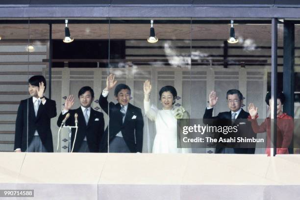 Prince Fumihito, Prince Naruhito, Crown Prince Akihito, Crown Princess Michiko, Prince Hitachi and Princess Hanako of Hitachi wave to well-wishers...