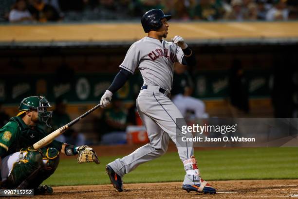 Michael Brantley of the Cleveland Indians at bat against the Oakland Athletics during the sixth inning at the Oakland Coliseum on June 29, 2018 in...