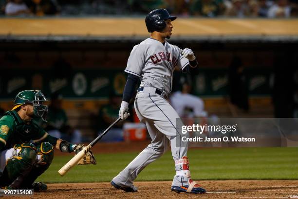 Michael Brantley of the Cleveland Indians at bat against the Oakland Athletics during the sixth inning at the Oakland Coliseum on June 29, 2018 in...