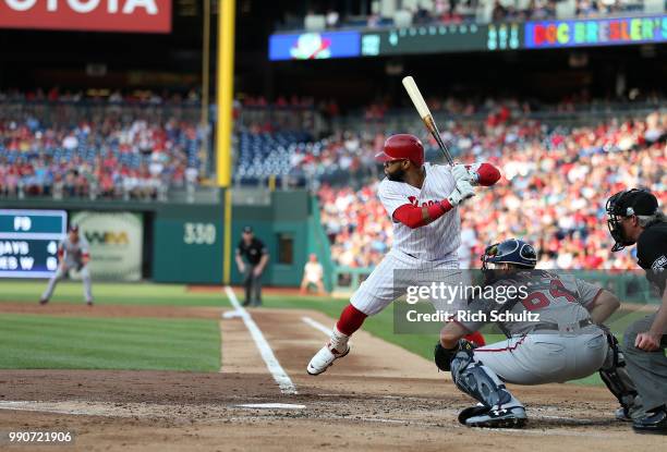 Carlos Santana of the Philadelphia Phillies in action against the Washington Nationals during a game at Citizens Bank Park on June 29, 2018 in...