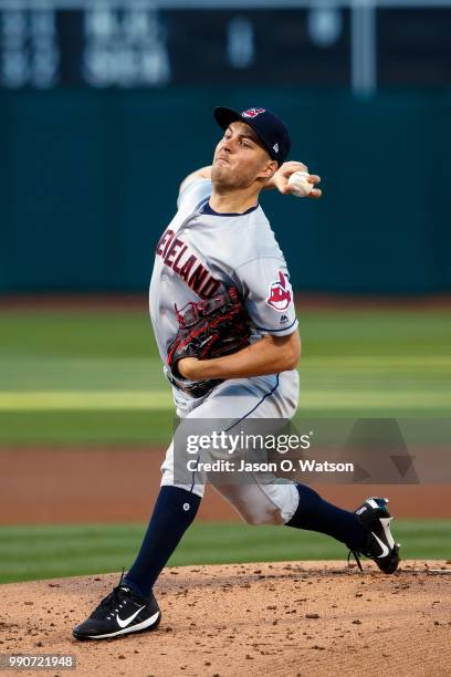 Trevor Bauer of the Cleveland Indians pitches against the Oakland Athletics during the first inning at the Oakland Coliseum on June 29, 2018 in...