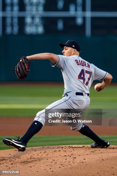 Trevor Bauer of the Cleveland Indians pitches against the Oakland Athletics during the first inning at the Oakland Coliseum on June 29, 2018 in...