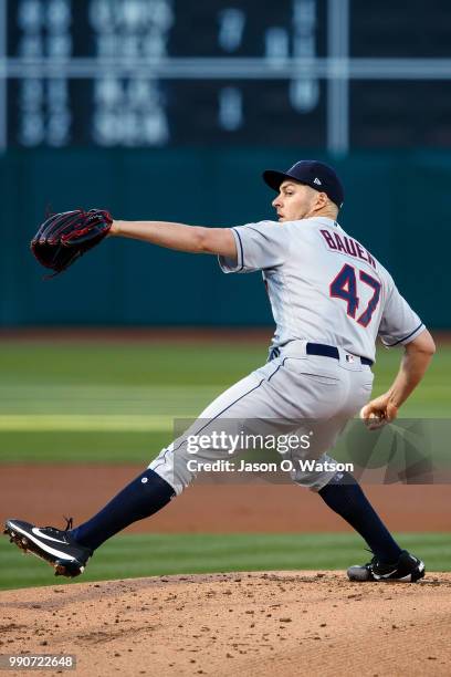 Trevor Bauer of the Cleveland Indians pitches against the Oakland Athletics during the first inning at the Oakland Coliseum on June 29, 2018 in...