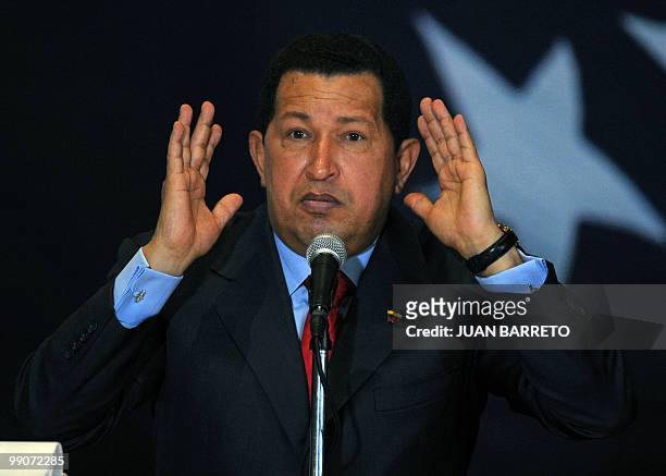 Venezuelan President Hugo Chavez gestures while delivering a speech during a ceremony to sign agreements with oil companies in the state-owned PDVSA...