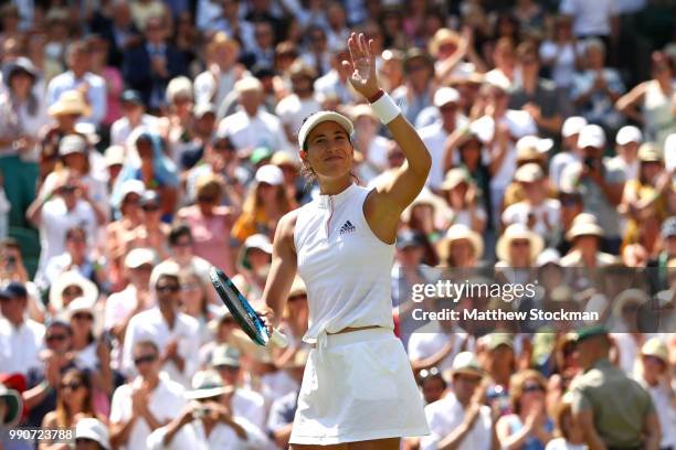 Garbine Muguruza of Spain celebrates her victory over Naomi Broady of Great Britain after their Ladies' Singles first round match on day two of the...