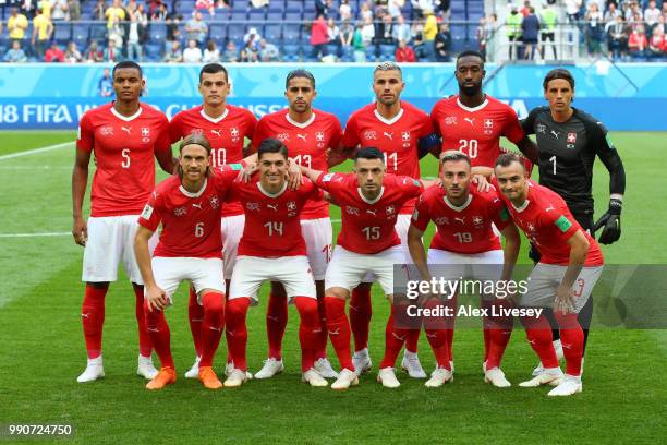 Switzerland pose for a team photo prior to the 2018 FIFA World Cup Russia Round of 16 match between Sweden and Switzerlandat Saint Petersburg Stadium...