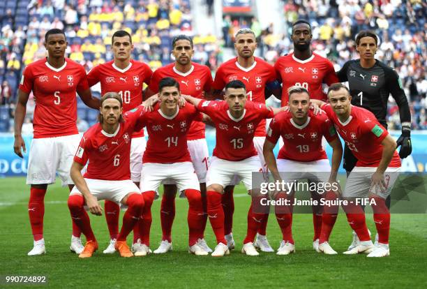 Switzerland pose for a team photo prior to the 2018 FIFA World Cup Russia Round of 16 match between Sweden and Switzerlandat Saint Petersburg Stadium...