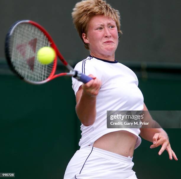 Elena Baltacha of Great Britain in action against Svetlana Kuznetsova of Russia during the girl's quarter finals of The All England Lawn Tennis...