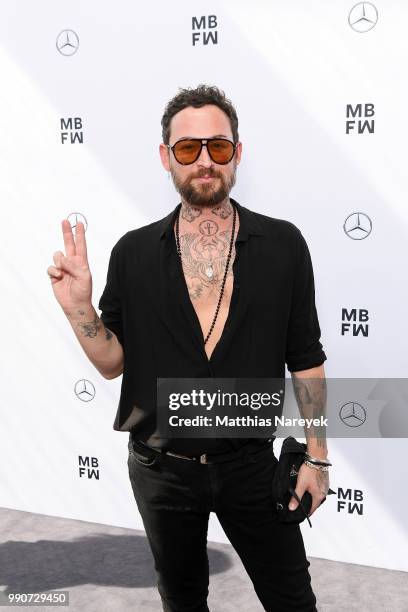 Marcel Ostertag attends the Lena Hoschek show during the Berlin Fashion Week Spring/Summer 2019 at ewerk on July 3, 2018 in Berlin, Germany.