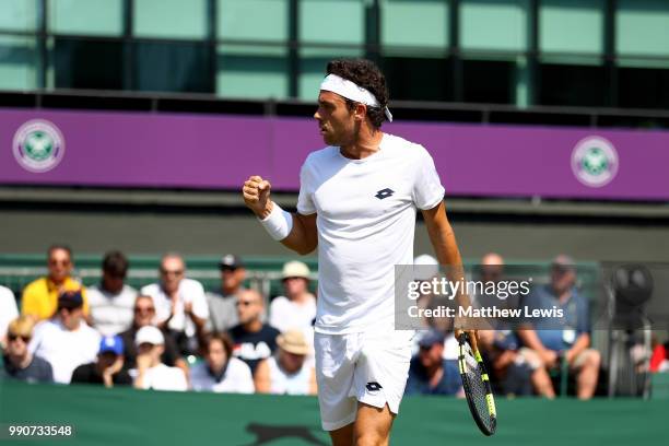 Marco Cecchinato of Italy celebrates a point against Alex De Minaur of Australia during their Men's Singles first round match on day two of the...