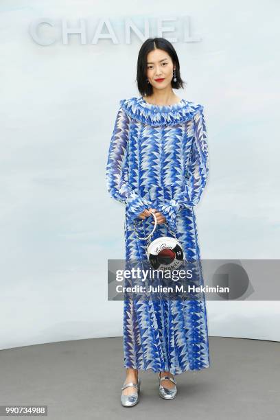 Liu Wen attends the Chanel Haute Couture Fall Winter 2018/19 show at Le Grand Palais on July 3, 2018 in Paris, France.