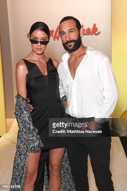 Rebecca Mir and her husband Massimo Sinato attends the Lena Hoschek show during the Berlin Fashion Week Spring/Summer 2019 at ewerk on July 3, 2018...