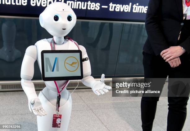 Robot Josie Pepper assists passengers travelling from the airport in Munich, Germany, 20 February 2018. Pepper is a humanoid robot programmed to...