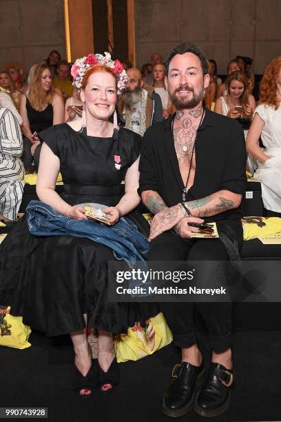 Enie van de Meiklokjes and Marcel Ostertag attend the Lena Hoschek show during the Berlin Fashion Week Spring/Summer 2019 at ewerk on July 3, 2018 in...