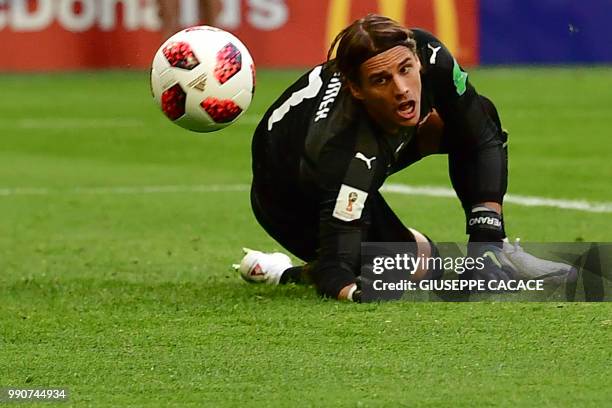 Switzerland's goalkeeper Yann Sommer looks at the ball during the Russia 2018 World Cup round of 16 football match between Sweden and Switzerland at...