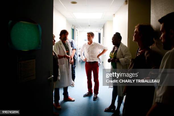 French lawmaker Francois Ruffin of the "La France Insoumise" left-wing party visits the psychiatric hospital "Pierre Janet" in Le Havre, on July 3,...