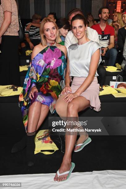 Marie von den Benken and Katrin Wrobel attend the Lena Hoschek show during the Berlin Fashion Week Spring/Summer 2019 at ewerk on July 3, 2018 in...