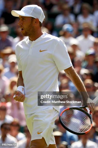 Dudi Sela of Isreal looks on during his Men's Singles first round match against Rafael Nadal of Spain on day two of the Wimbledon Lawn Tennis...