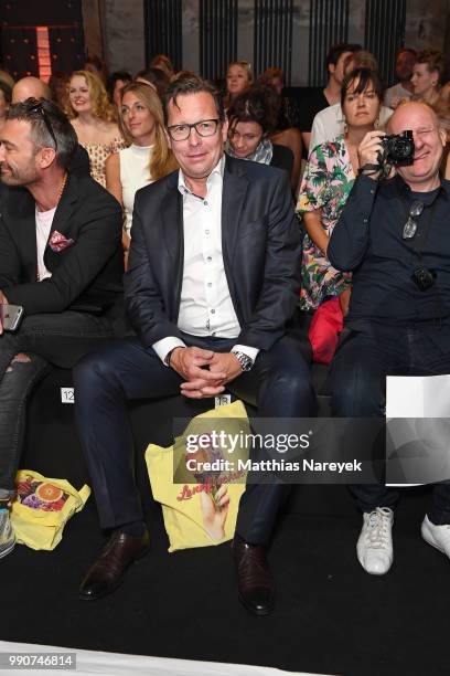 Robert Poelzer attends the Lena Hoschek show during the Berlin Fashion Week Spring/Summer 2019 at ewerk on July 3, 2018 in Berlin, Germany.