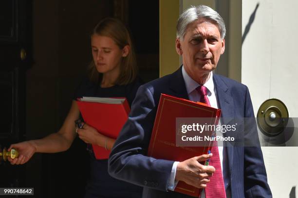 British Chancellor of the Exchequer, Philip Hammond, leaves Downing Street to make his way to the House of Commons, London on July 3, 2018.