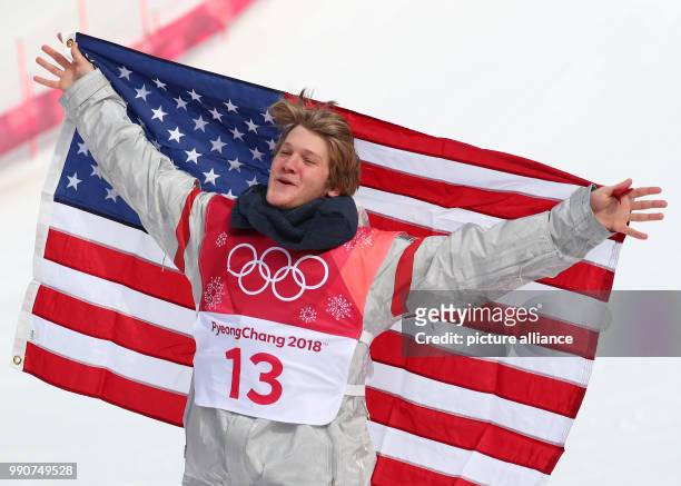 Kyle Mack from USA celebrates his silver medal during the Snowboard Big Air finals in Pyeongchang, South Korea, 24 February 2018. Photo: Daniel...