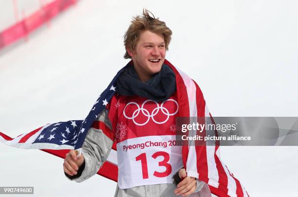 Kyle Mack from USA celebrates his silver medal during the Snowboard Big Air finals in Pyeongchang, South Korea, 24 February 2018. Photo: Daniel...