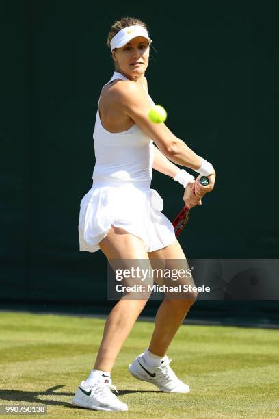 Eugenie Bouchard of Canada returns against Gabriella Taylor of Great Britain during their Ladies' Singles first round match on day two of the...