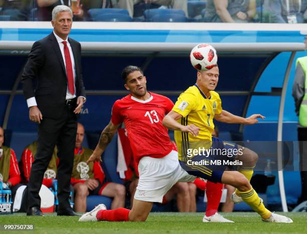 Sebastian Larsson of Sweden national team and Ricardo Rodriguez of Switzerland national team vie for the ball during the 2018 FIFA World Cup Russia...