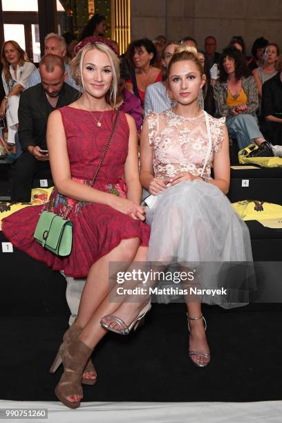 Anna Hofbauer and sister Sissi Hofbauer attend the Lena Hoschek show during the Berlin Fashion Week Spring/Summer 2019 at ewerk on July 3, 2018 in...