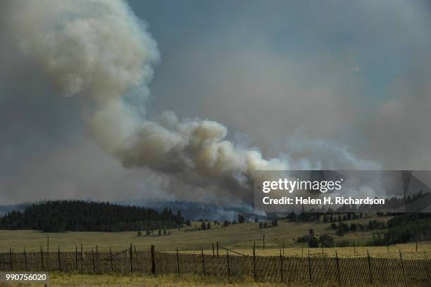 Large plume of smoke begins to build in the afternoon on the Weston Pass Fire on July 2, 2018 near Fairplay, Colorado. The fire, burning about 20...