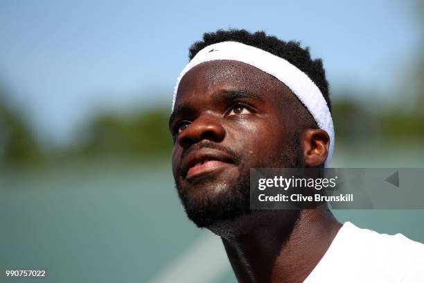 Frances Tiafoe of the United States looks on during his Men's Singles first round match against Fernando Verdasco of Spain on day two of the...