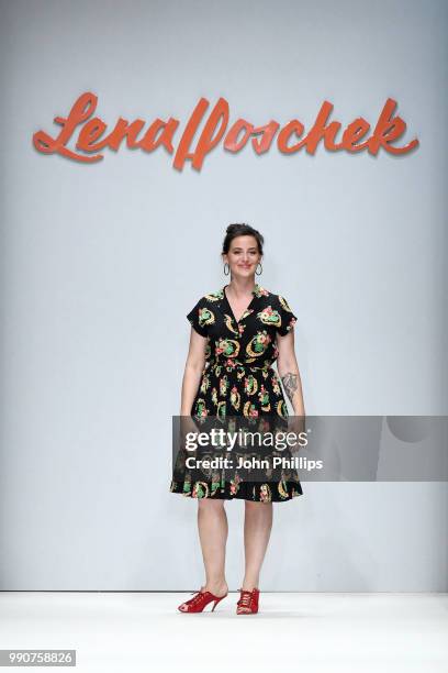 Designer Lena Hoschek responds to applause after her show during the Berlin Fashion Week Spring/Summer 2019 at ewerk on July 3, 2018 in Berlin,...