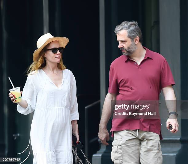 Leslie Mann and Judd Apatow are seen walking in soho on July 3, 2018 in New York City.