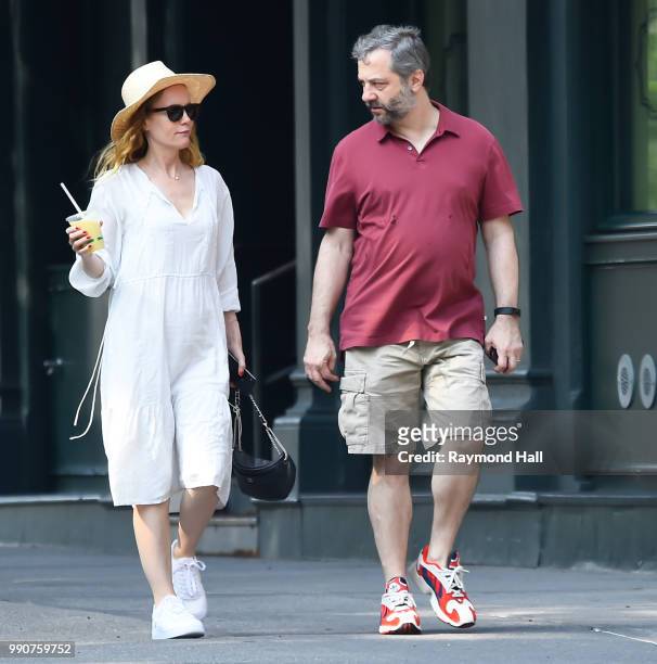 Leslie Mann and Judd Apatow are seen walking in soho on July 3, 2018 in New York City.