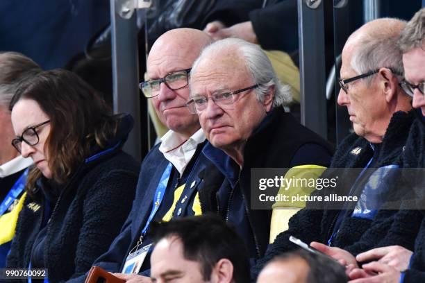 King Carl XVI. Gustaf of Sweden watches the men's finals between the US and Sweden at the Curling Centre in Gangneung, South Korea, 24 February 2018....