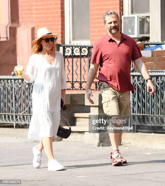 Leslie Mann and Judd Apatow are seen walking in soho on July 3, 2018 in New York City.