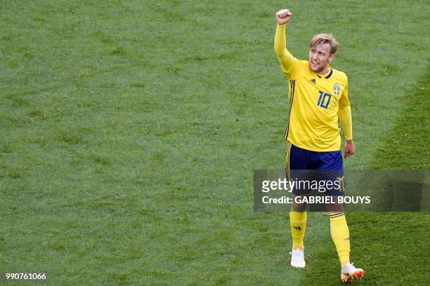Sweden's midfielder Emil Forsberg celebrates after scoring during the Russia 2018 World Cup round of 16 football match between Sweden and Switzerland...