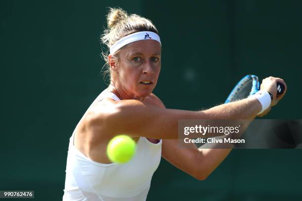 Pauline Parmentier of France returns against Taylor Townsend of The United States during their Ladies' Singles first round match against on day two...