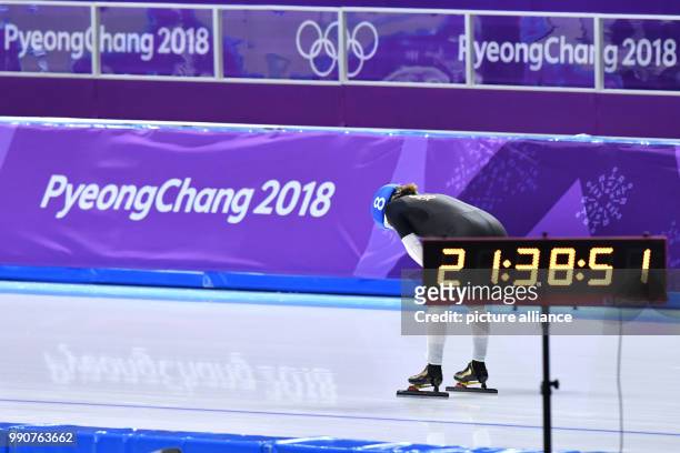 German speed skater Claudia Pechstein rests after passing the finish line at the Gangneung Oval in Gangneung, South Korea, 24 February 2018. Photo:...
