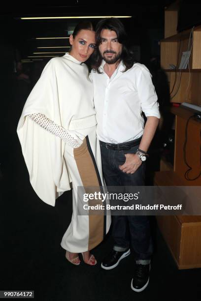 Model Nieves Alvarez and Stylist Stephane Rolland pose prior the Stephane Rolland Haute Couture Fall Winter 2018/2019 show as part of Paris Fashion...