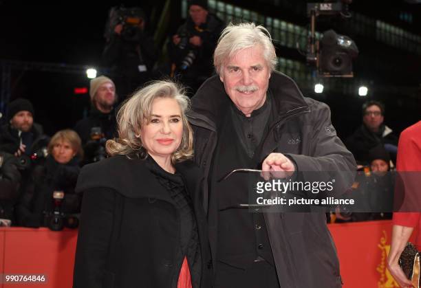 Actor Peter Simonischek and his wife Brigitte appear at the award ceremony of the 68th Berlinale International Film Festival in Berlin, Germany, 24...