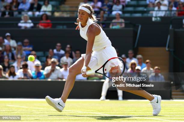 Petra Kvitova of Czech Republic returns against Aliaksandra Sasnovich of Belarus during their Ladies' Singles first round match on day two of the...