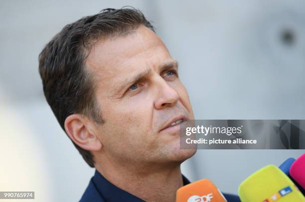 July 2018, Germany, Frankfurt am Main: Oliver Bierhoff, the German national soccer team's manager, giving a statement before the headquarters of the...