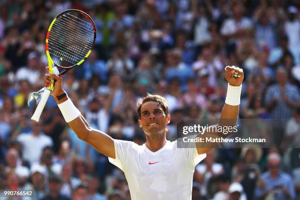 Rafael Nadal of Spain celebrates match point against Dudi Sela of Isreal during their Men's Singles first round match on day two of the Wimbledon...