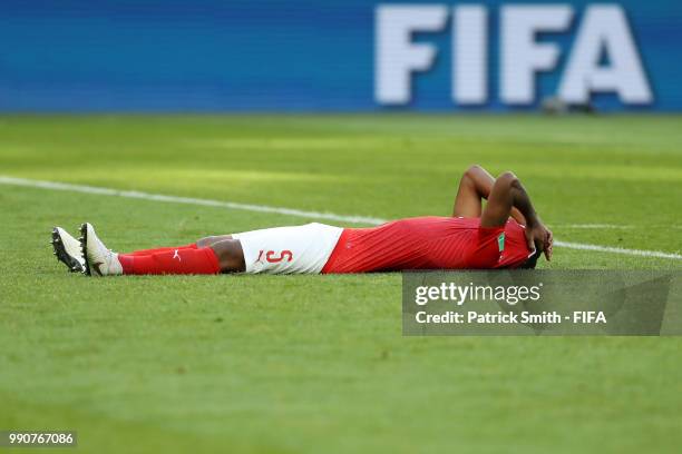 Manuel Akanji of Switzerland looks dejected following his sides defeat in the 2018 FIFA World Cup Russia Round of 16 match between Sweden and...