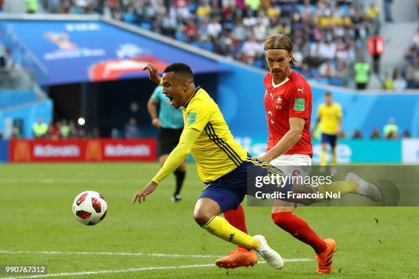 Martin Olsson of Sweden is fouled by Michael Lang of Switzerland leading to Michael Lang of Switzerland recieving a red card, and after a VAR review,...