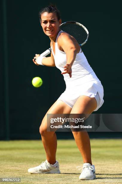 Veronica Cepede Royg of Paraguay returns against Katie Boulter of Great Britain during their Ladies' Singles first round match on day two of the...