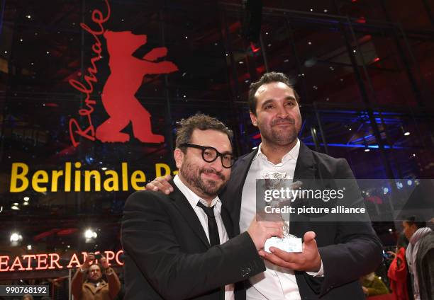 February 2018, Germany, Berlin, Award Ceremony, Berlinale Palace: Manuel Alcala and Alonso Ruizpalacios receive the Silver Bear for Best Screenplay...