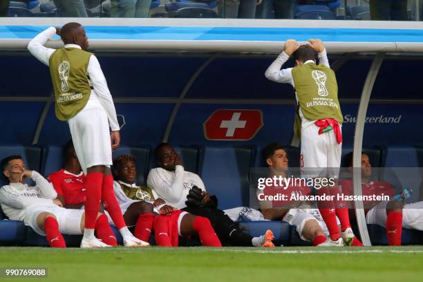 Switzerland players look dejected following their sides defeat in the 2018 FIFA World Cup Russia Round of 16 match between Sweden and Switzerland at...